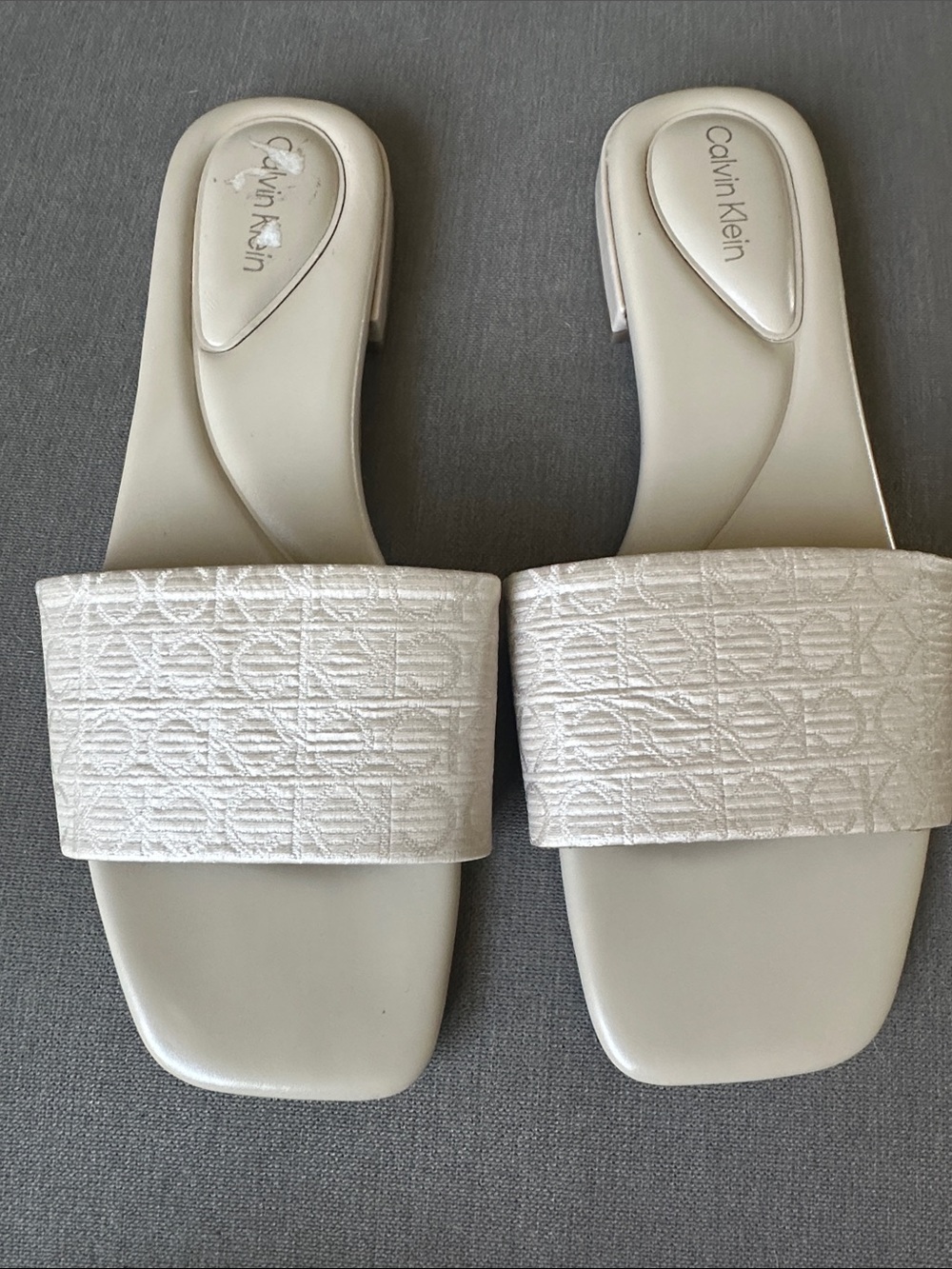 Calvin Klein Pearl White Embossed Logo Slide Sandals